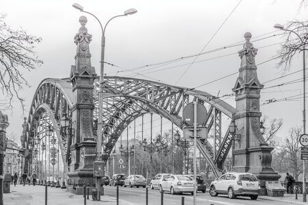 Greyscale Photo of a Bridge With Cars Being Caught in a Traffic during a Snow Weather