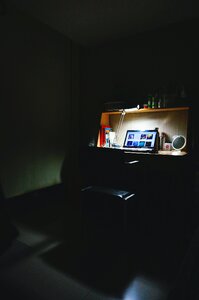 Black Laptop in Study Table Near Lamp photo