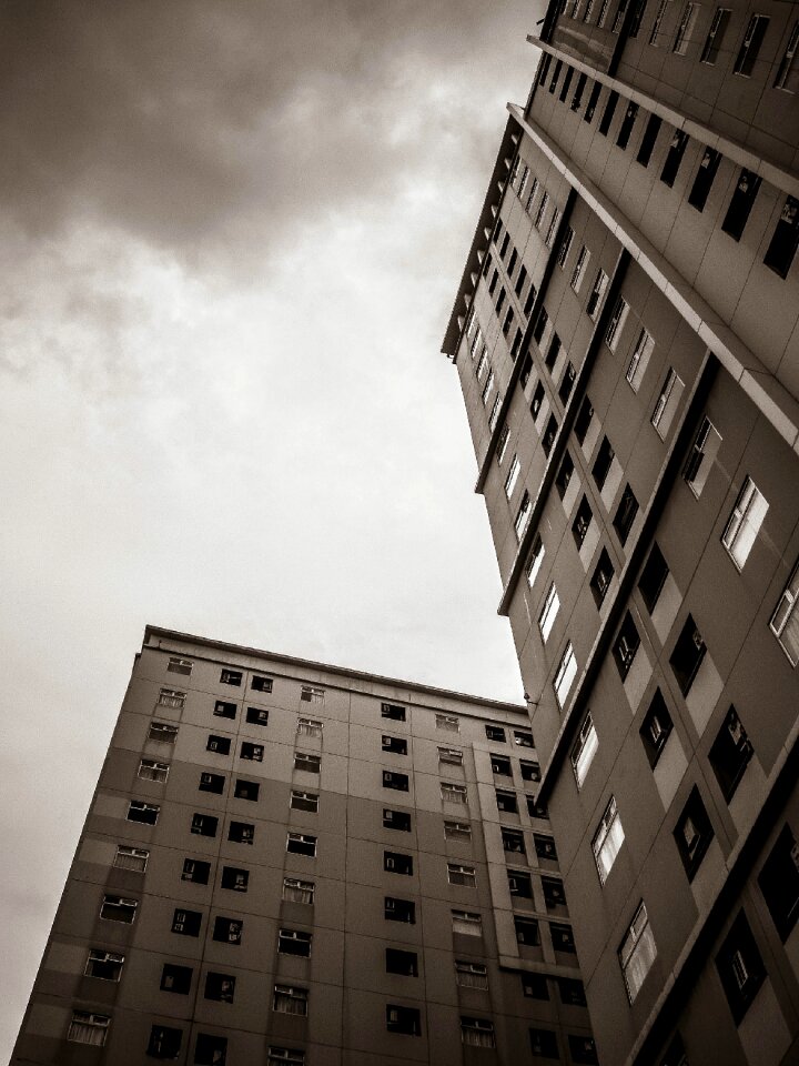 Grayscale Photo of High Rise Building