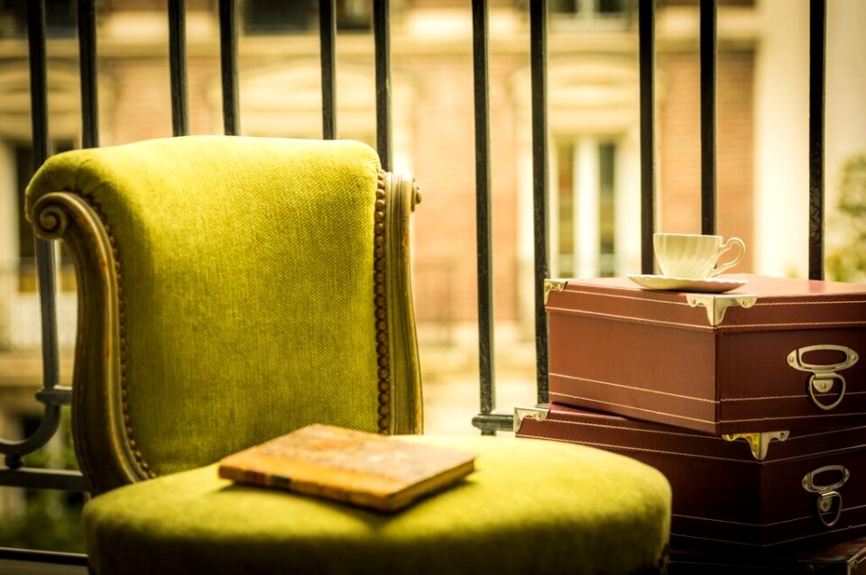 Yellow Book on Green Ottoman