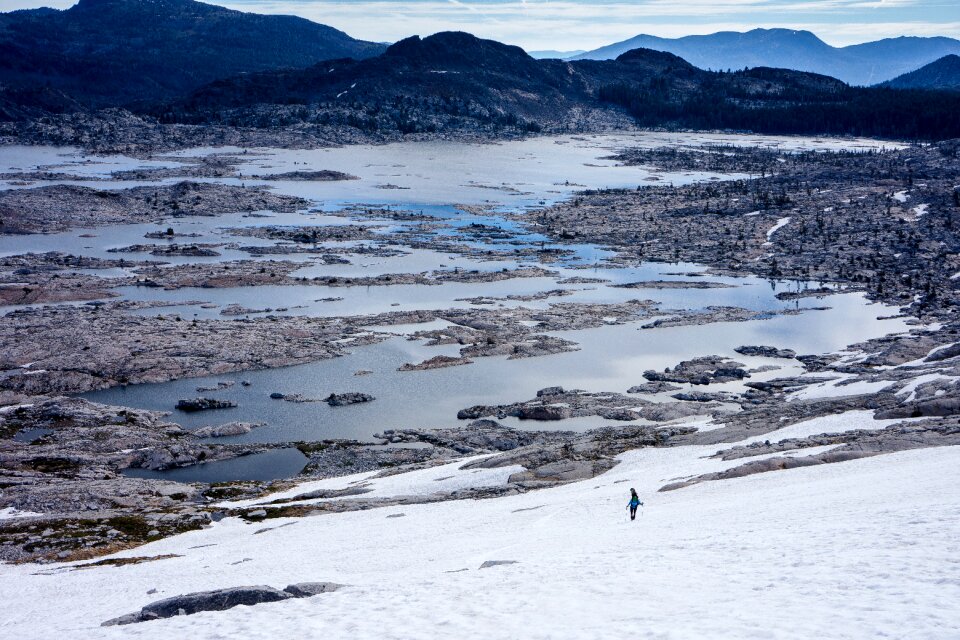 Person Walking on Snowy Field photo