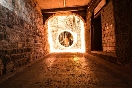 Timelapse Photo of Man in Hallway With Light photo