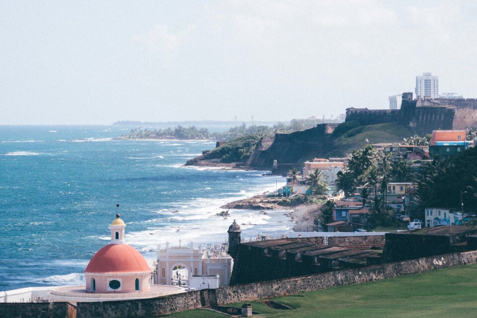 Photo of a Sea With Lighthouse on Daytime