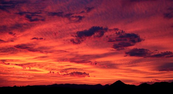 Silhouette of Mountain Range during Sunset photo