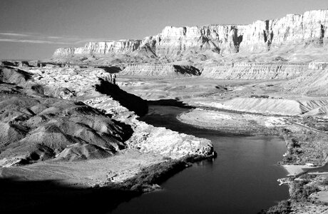 Black and White Photo of Mountains and River photo