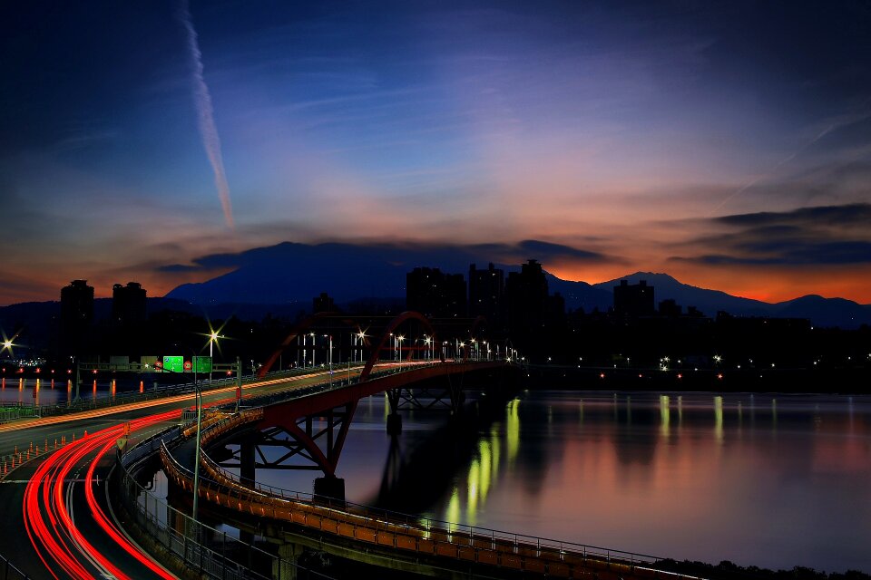 Light Rays on Bridge during Nighttime