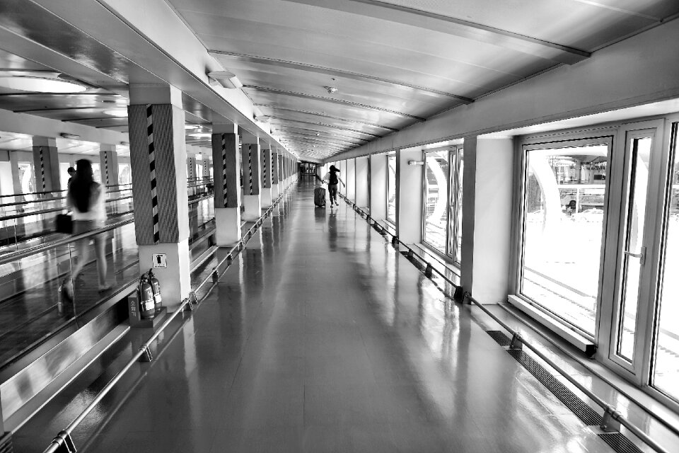 Woman Running on Hallway