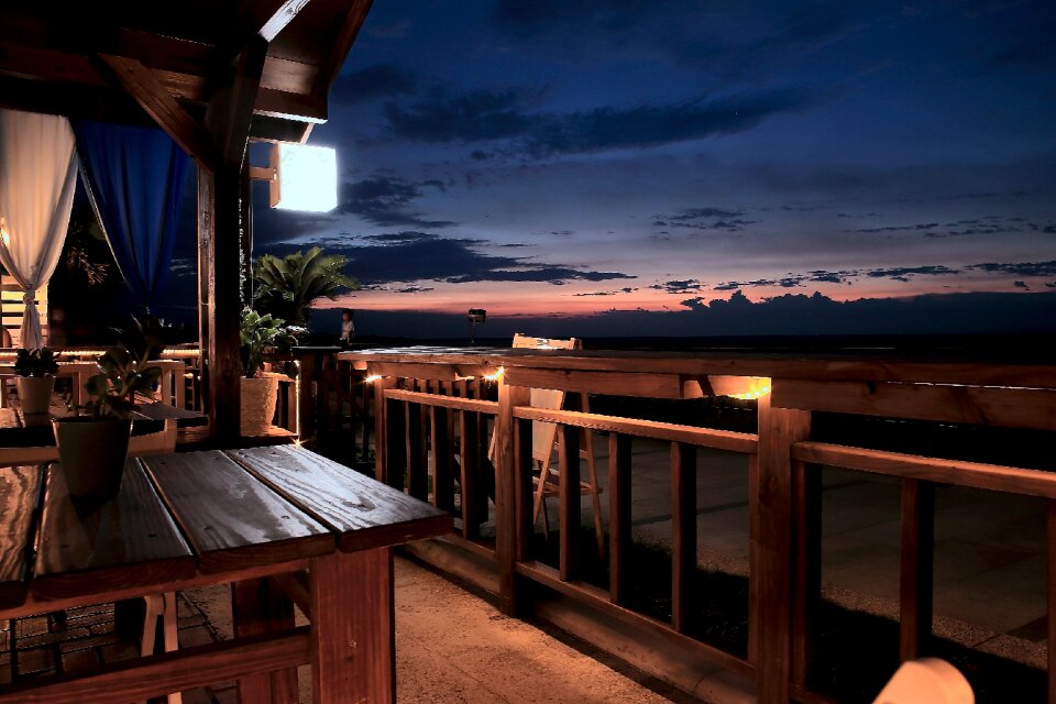 Vacant Tables and Chairs in the Balcony