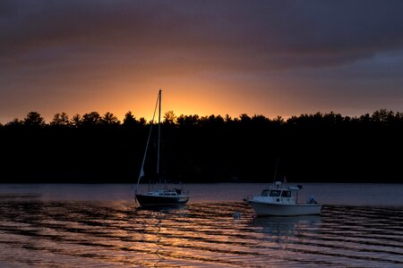 2 Speed Boat on Body of Water during Sunrise photo