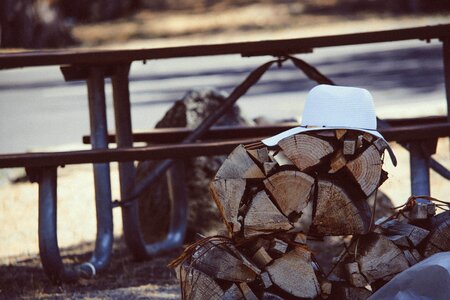 White Hat on Brown Firewood photo