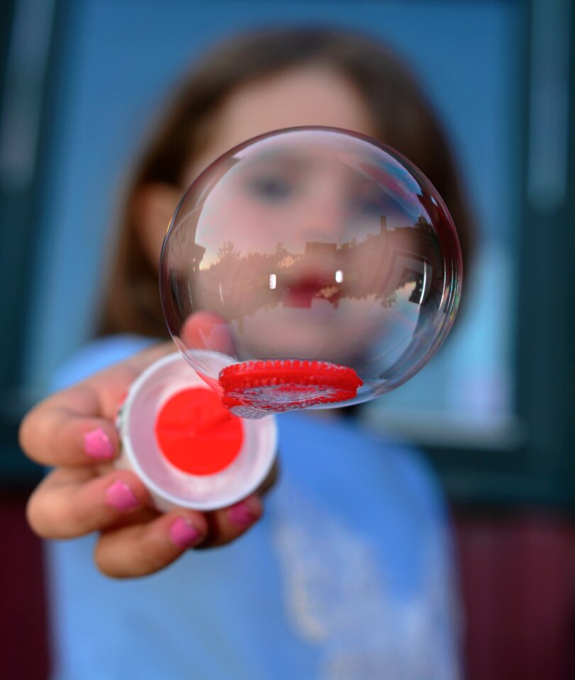 Girl Making Bubbles Selective Focus Photography