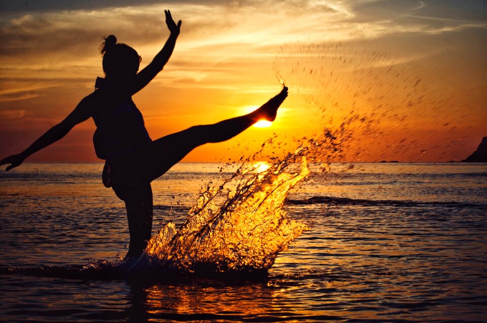 Woman in Water during Golden Hour photo