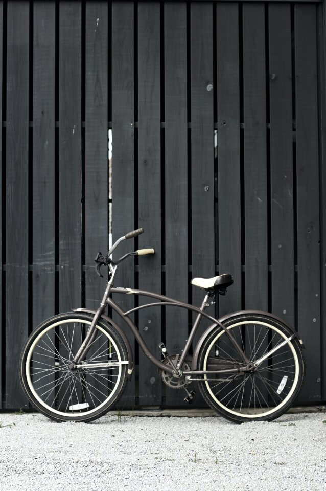 Bicycle Parked Against Wall