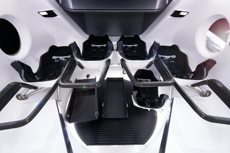 Futuristic interior of contemporary spaceship with passenger seats