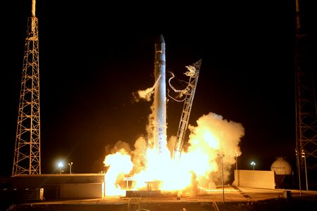 Night rocket liftoff into outer space photo