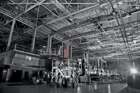 American flag hanging in industrial futuristic factory photo