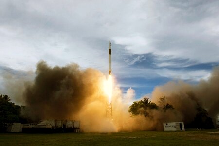 Liftoff of spacecraft on cloudy day photo