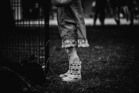 Monochrome Photography of Children Wearing Boots photo