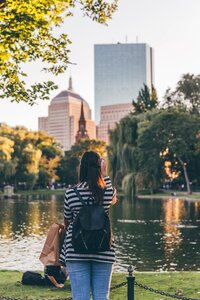 Photo of Woman Standing Near Body of Water