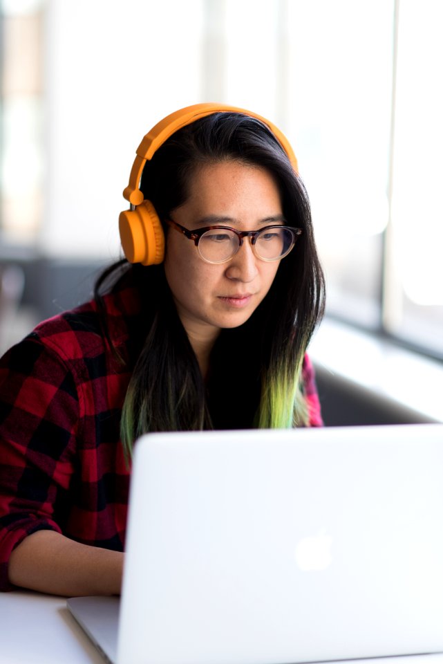 Woman Infront Of Macbook