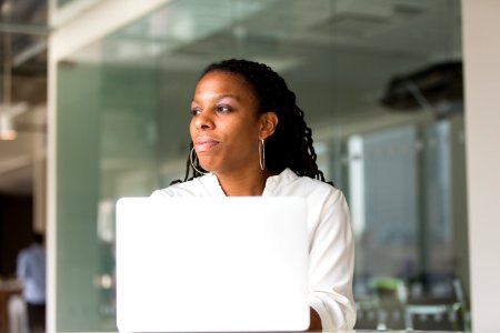 Photography Of Woman Using Laptop