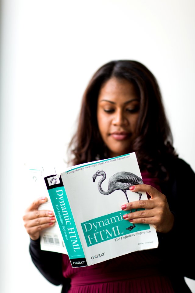 Woman Holding Dynamic Html Book