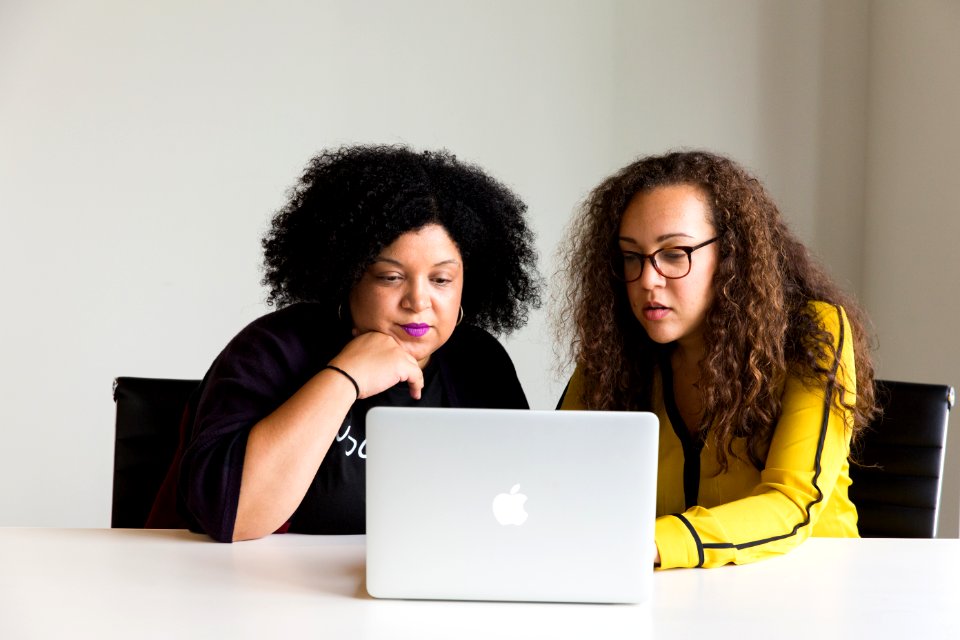 Photography Of Women Using Laptop