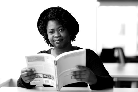 Monochrome Photography Of Woman Reading Book photo