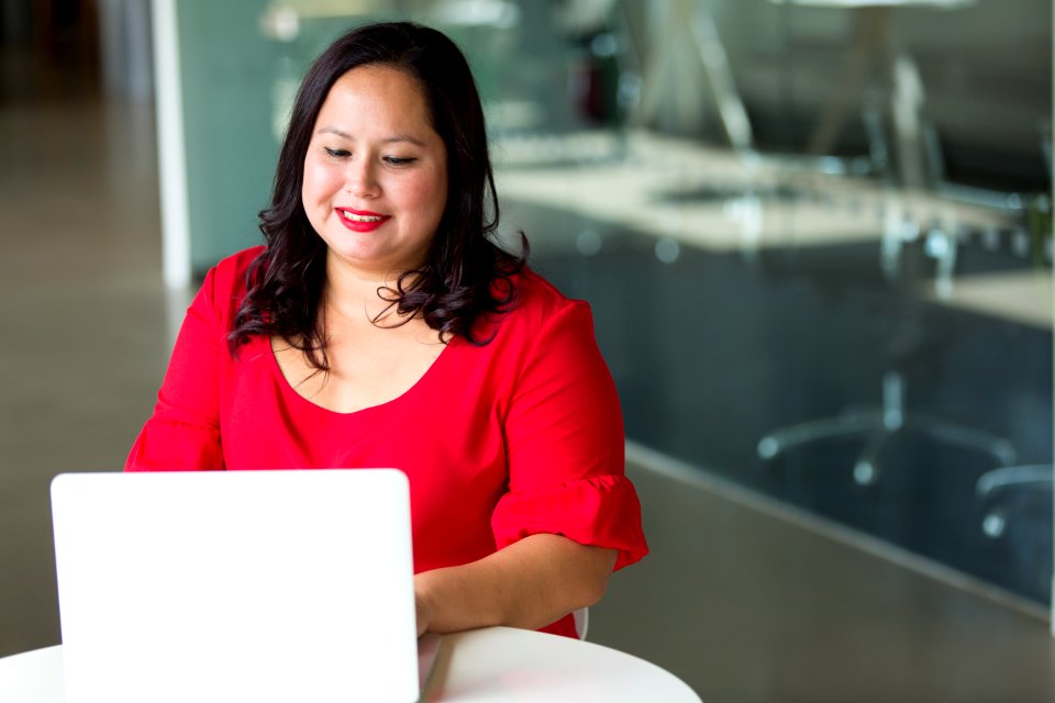 Photography Of Woman Using Laptop