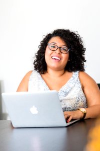 Photography Of Woman Using Laptop