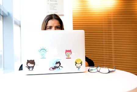 Woman Sitting In Front Of Laptop photo