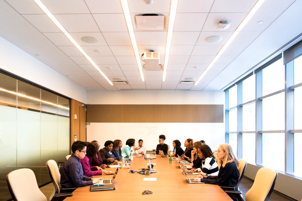 Group Of People In Conference Room