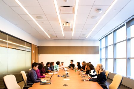 Group Of People In Conference Room photo