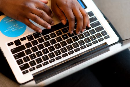 Person Using Silver Laptop Computer photo