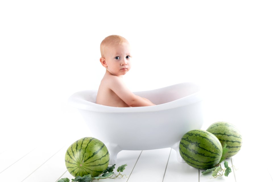 Photography Of Baby On Bathtub