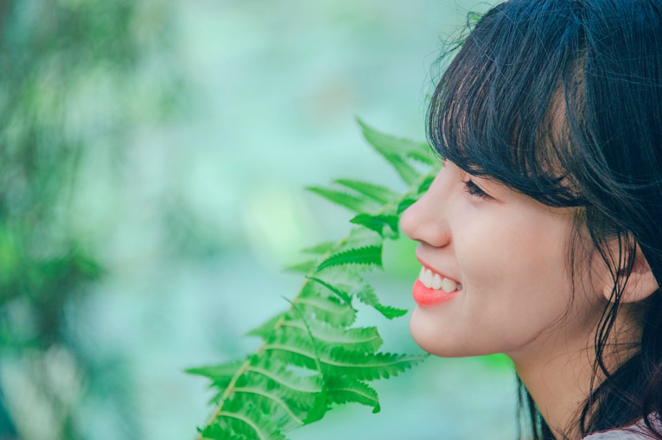 Close-Up Photography Of Woman Smiling photo