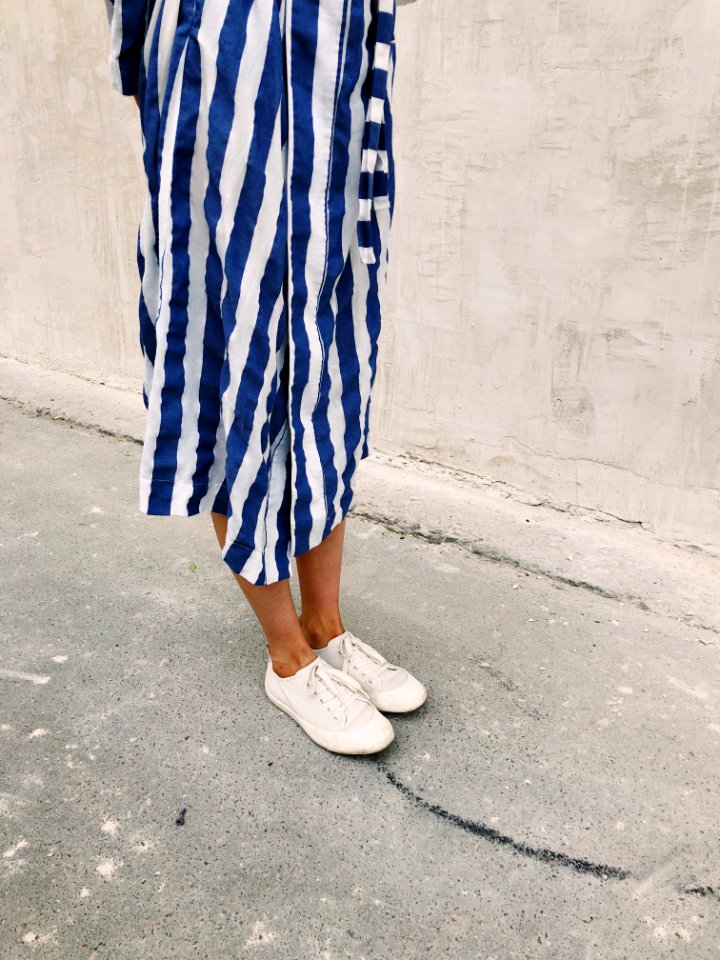 Woman Wearing White Plimsolls