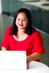 Photography Of Woman Using Laptop photo