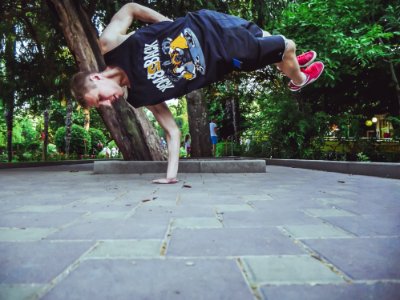 Person Balancing Using One Hand photo