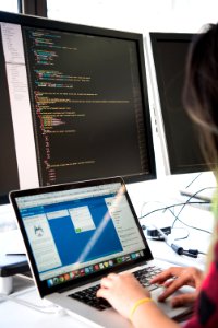 Photography Of Woman Using Laptop