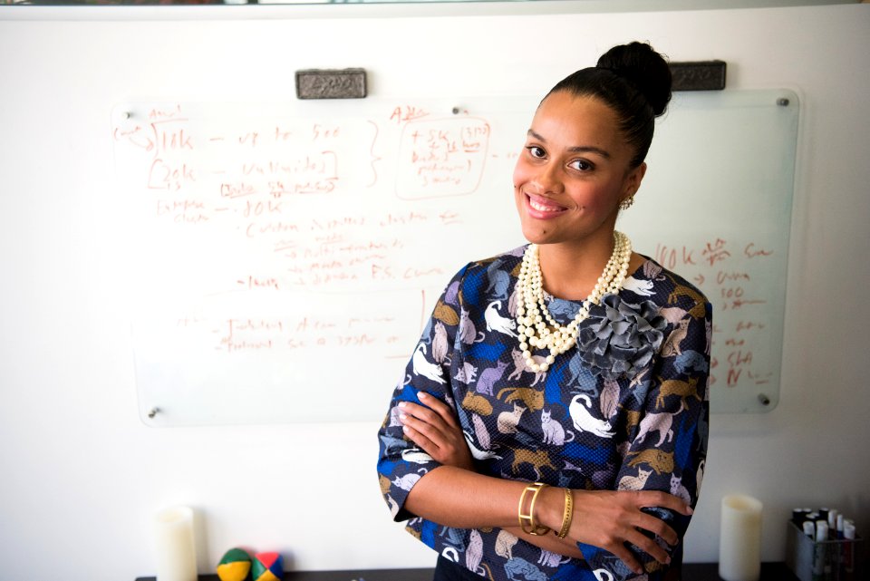 Woman Standing In Front Of Whiteboard
