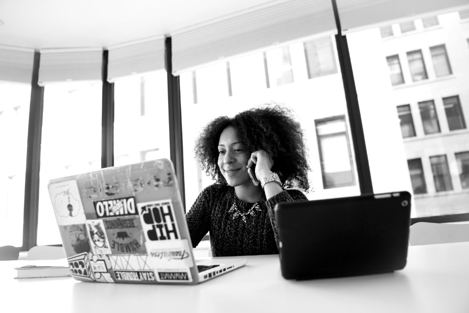 Grayscale Photo Of Woman Using Laptop