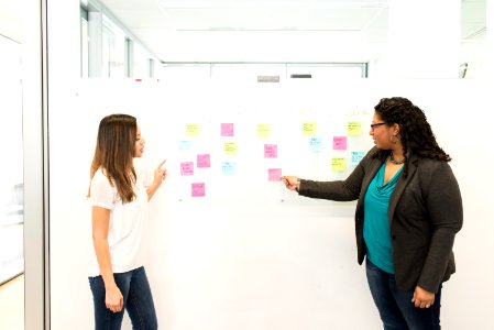 Two Woman Having Conversation