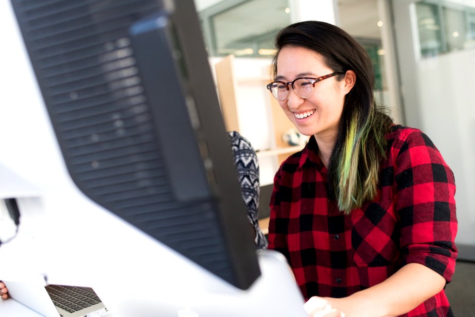 Woman Facing Computer Monitor