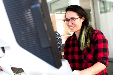 Woman Facing Computer Monitor