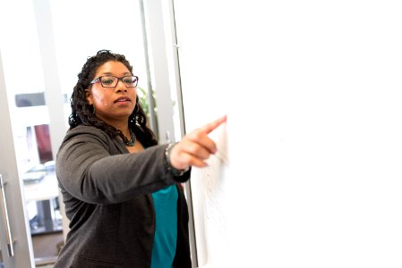 Woman Beside Whiteboard