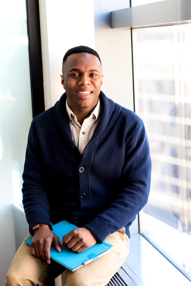 Man Wearing Blue Button-up Sweater