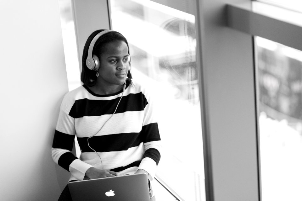 Photography Of Woman Listening To Music