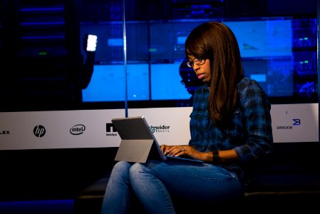 Photo Of Woman In Blue Jeans Using Laptop