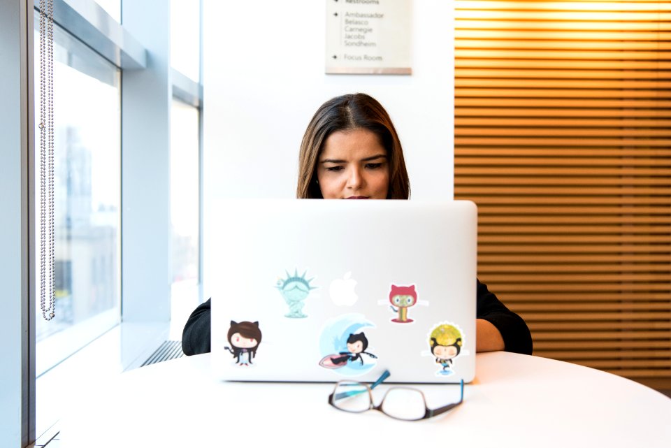 Woman Using Macbook